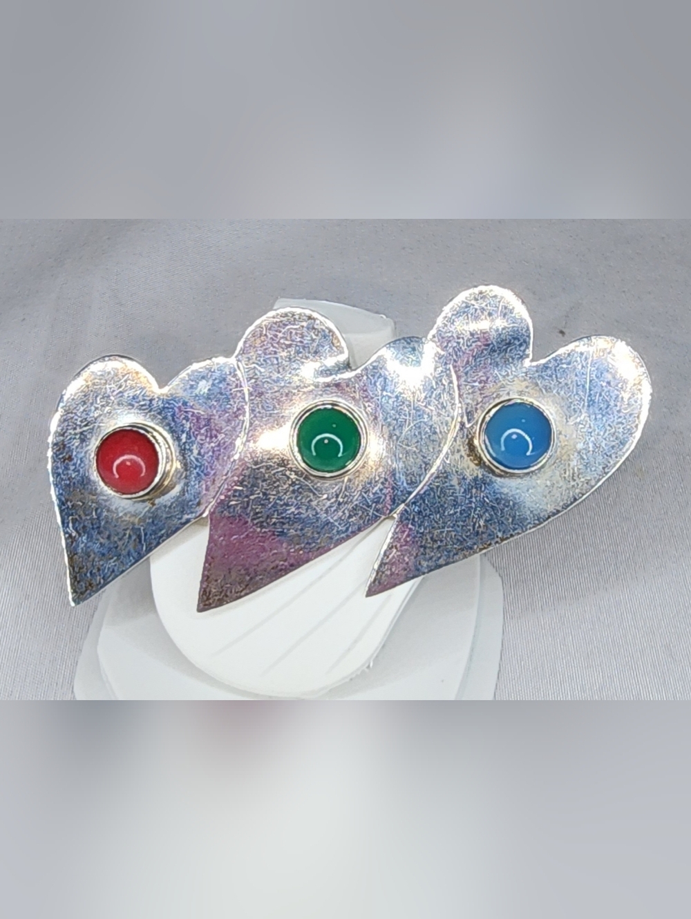 Vintage sterling silver brooch, three overlapping hearts W/Gemstones